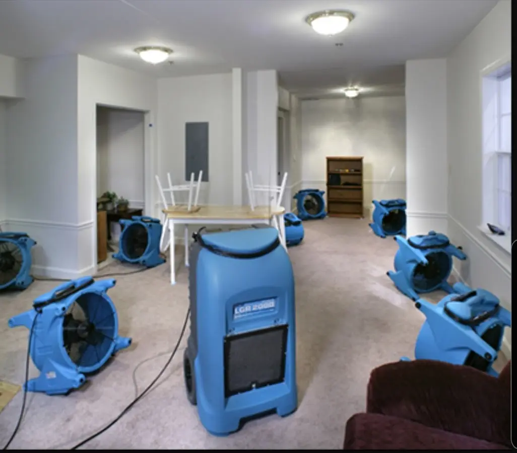 Air movers and dehumidifier setup for Water Damage Restoration in Kimball